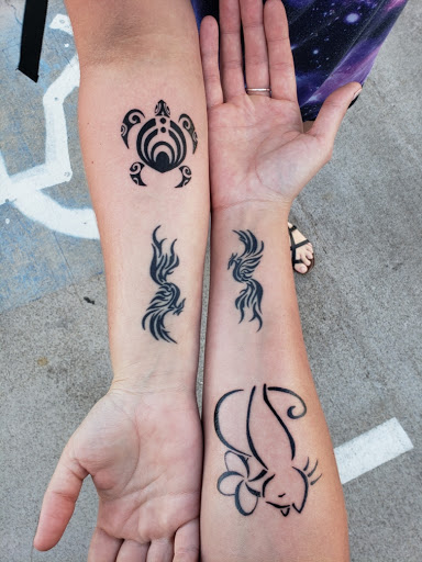 Explore diving tattoo ideas, creative tattoo ideas in Kailua Kona, available at Lady Luck Tattoo & Body Piercing