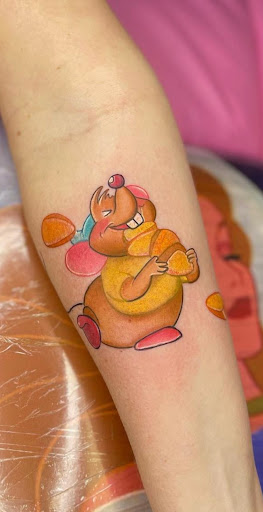 Explore snowboard tattoo ideas, creative tattoo ideas in Tehachapi, available at Briar Rose TATTOO