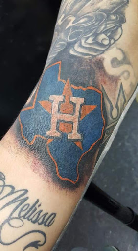 Explore dog bone tattoo ideas, creative tattoo ideas in Houston, available at 3rd Coast Custom Tattoos & Body Piercings Studio