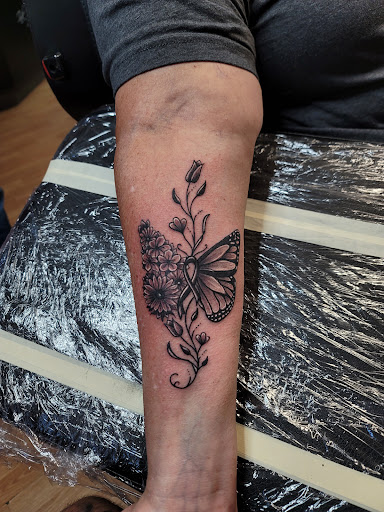 Explore forearm sleeve tattoo ideas for guys, creative tattoo ideas in Shelbyville, available at Ink & Skin Studios Inc