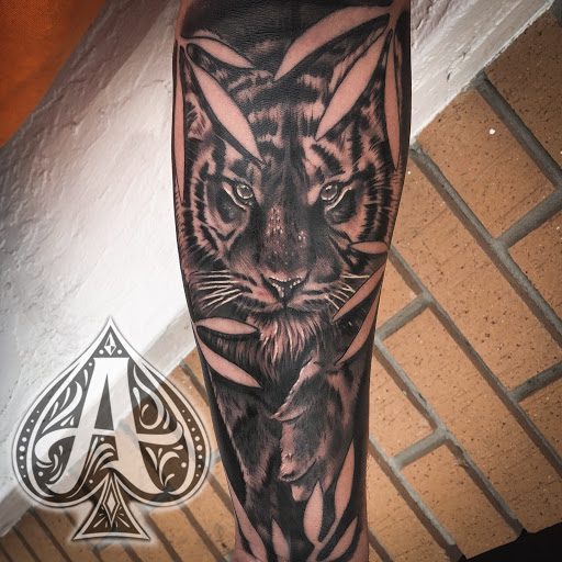 Explore side hand tattoo ideas, creative tattoo ideas in Winter Haven, available at Aces Ink - Tattoos & Piercings