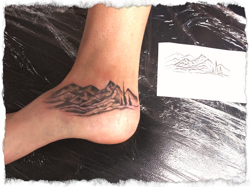 Explore mens tattoo sleeve ideas black and grey, creative tattoo ideas in La Crosse, available at La Crosse Tattoo