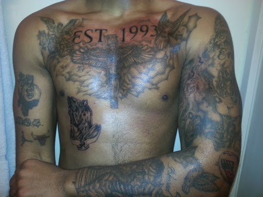 Explore matching tattoos for father and son ideas, creative tattoo ideas in Whitehall, available at Beachside Tattoos & Smoke Shop