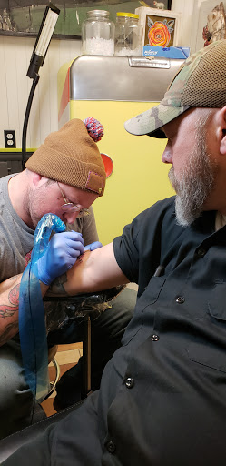 Explore men's tattoo ideas forearm, creative tattoo ideas in Laramie, available at Rolling Tattoo