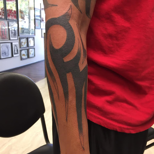 Explore western tattoo ideas for females, creative tattoo ideas in Bristol, available at Golden Rule Tattoo