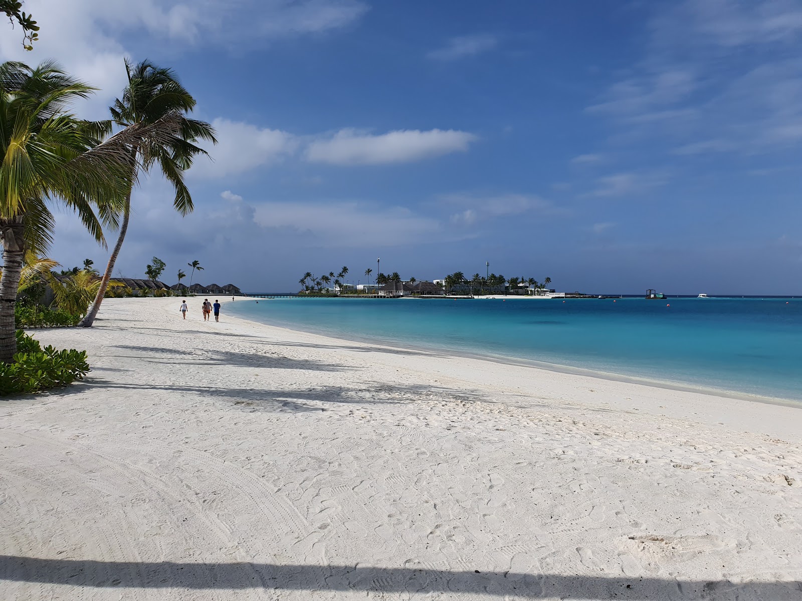 Foto van Sun Siyam Strand met turquoise puur water oppervlakte