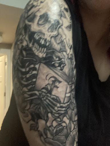 Find tattoo ideas on leg for your next unique tattoo in Somerville at Pearl Street Tattoo Club