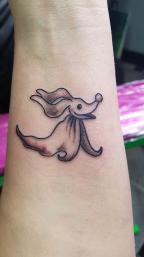 Tattoo Shop «Asylum», reviews and photos, 111 Welch Ave, Ames, IA 50014, USA