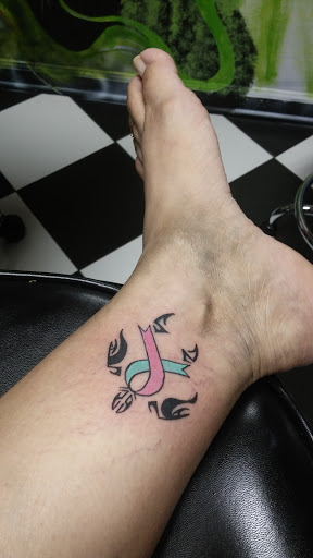 Explore split personality tattoo ideas, creative tattoo ideas in Jacksonville, available at Cover Up Tattoos