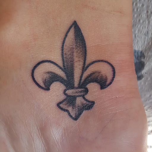 Explore finger tattoo ideas for guys, creative tattoo ideas in Metairie, available at Galactic Tattoo Studio