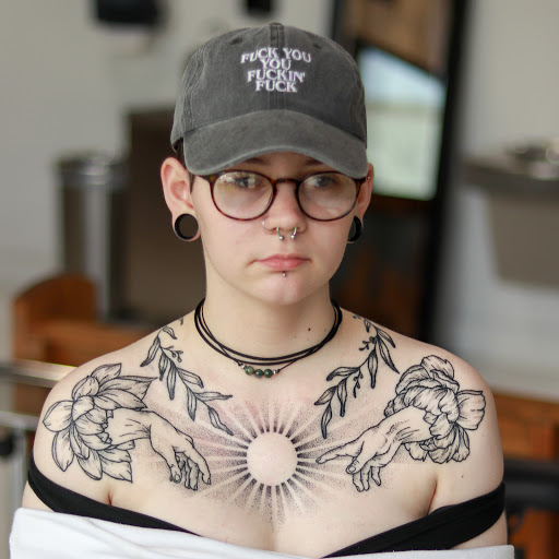 Explore lower back tattoo ideas, creative tattoo ideas in Lufkin, available at Black Spot Tattoo Company