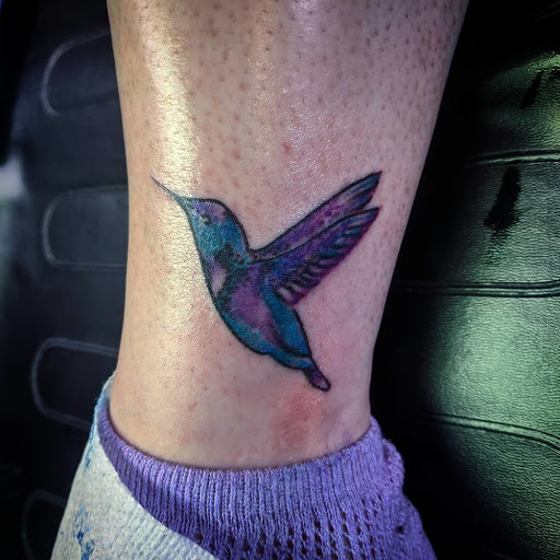 Explore butterfly and rose tattoo ideas, creative tattoo ideas in Richmond, available at Tarot Tattoo