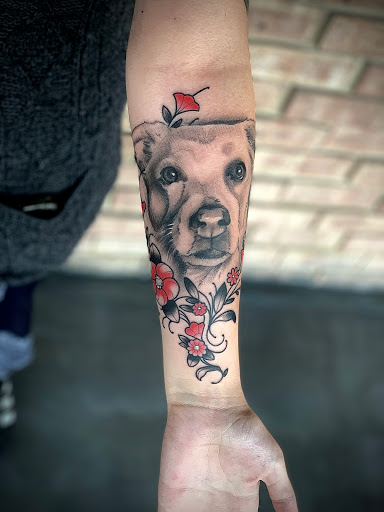 Explore flower spine tattoo ideas, creative tattoo ideas in Tallmadge, available at Killjoy tattoo