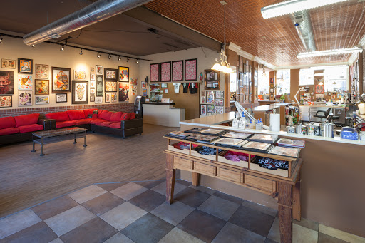 Explore mens quad tattoo ideas, creative tattoo ideas in Denver, available at Think Tank Tattoo