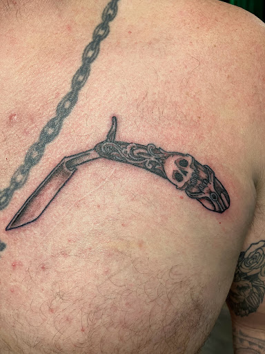 Explore cat and dog tattoo ideas, creative tattoo ideas in Kewanee, available at Splat Ink tattoos and piercings