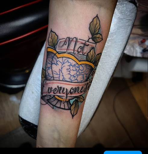 Explore mens shin tattoo ideas, creative tattoo ideas in Cedar Falls, available at The Iron Quill Tattoo Parlor
