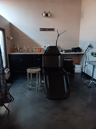 Explore father tattoo ideas for son, creative tattoo ideas in Lawton, available at Piercing Society