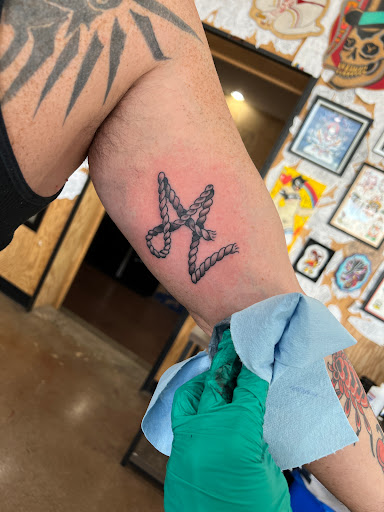 Explore ideas for ring tattoos, creative tattoo ideas in Phoenix, available at Golden Rule Tattoo Camelback