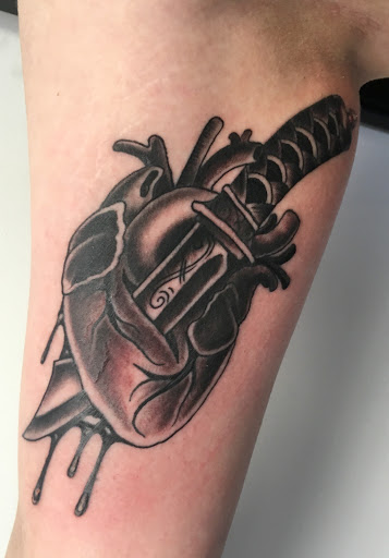 Explore thyroid cancer tattoo ideas, creative tattoo ideas in Poughkeepsie, available at Tattoo Voodoo