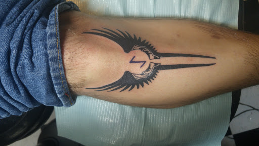 Tattoo Shop «Vertigo Tattoo & Body Piercing», reviews and photos, 7594 Shipyard Rd, Manns Harbor, NC 27953, USA