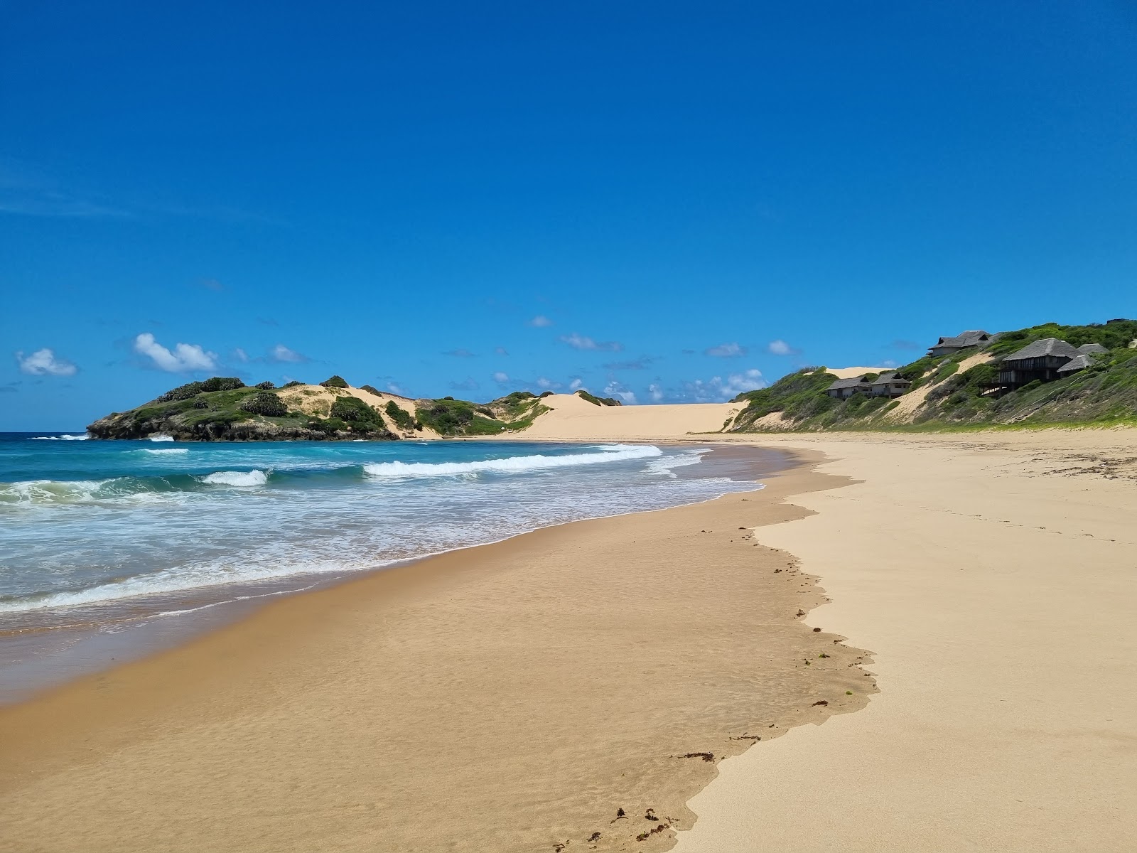 Foto de Praia da Rocha con arena beige superficie