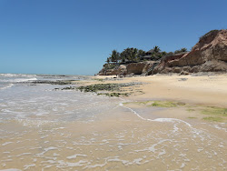 Photo de Plage de Tororao entouré de montagnes
