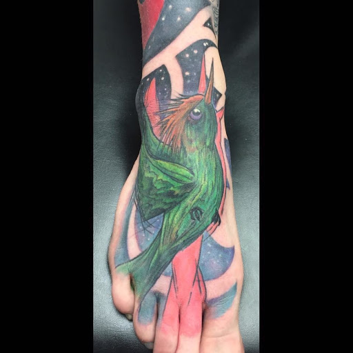 Explore tattoo cover up ideas on leg, creative tattoo ideas in Virginia Beach, available at Studio Evolve