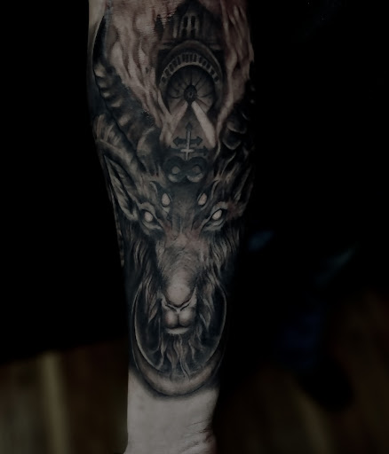 Explore back tattoo ideas for men, creative tattoo ideas in Clarksville, available at Dark Raine Tattoo