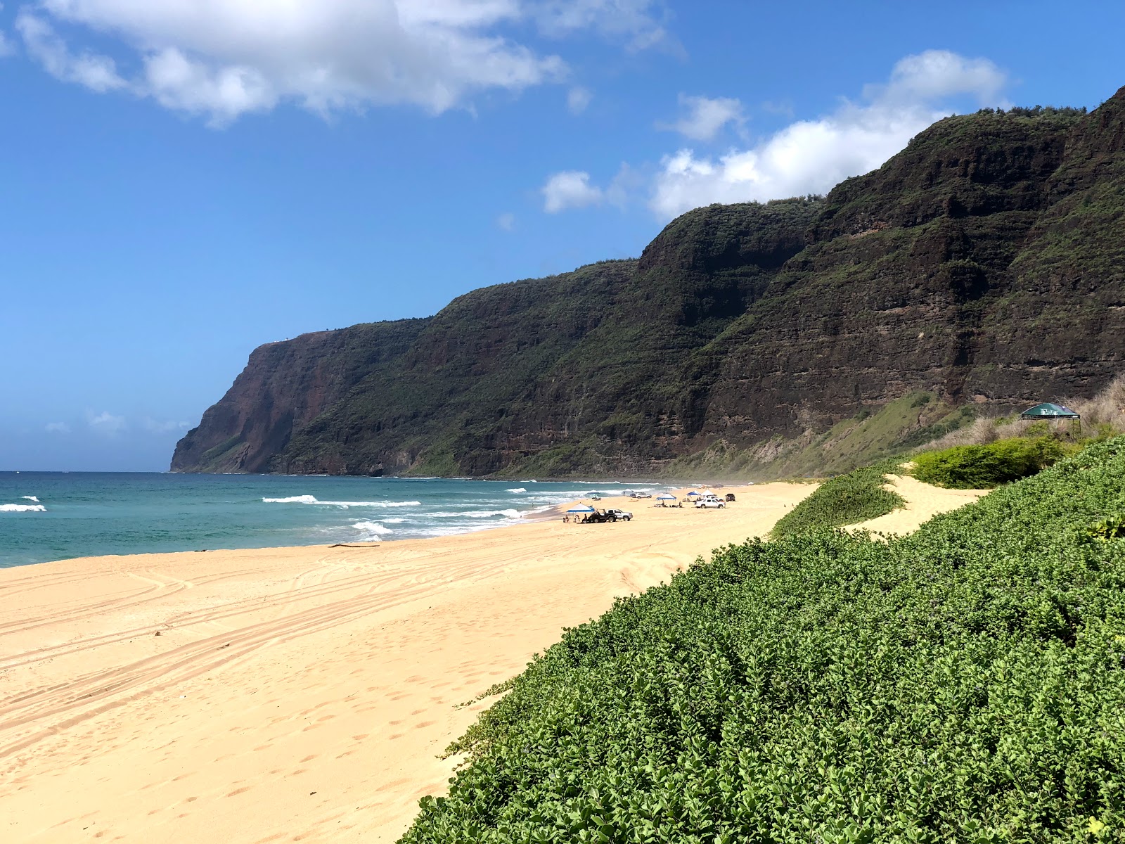 Photo of Polihale State Beach with turquoise pure water surface