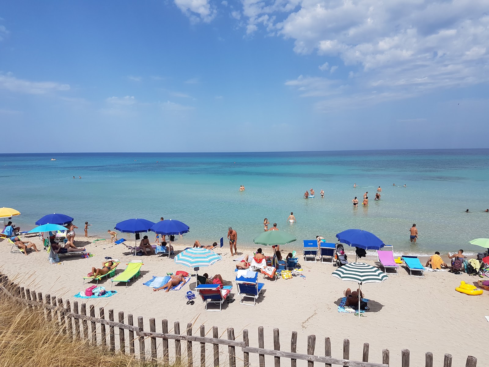 Spiaggia di Pilone'in fotoğrafı parlak kum yüzey ile