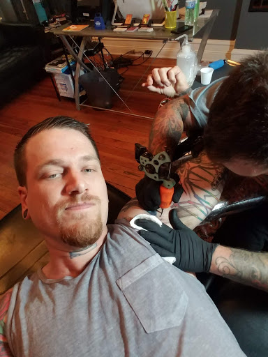 Explore tattoo ideas for men's shoulders, creative tattoo ideas in Reading, available at Olde Penn Ave. Tattoo Co.