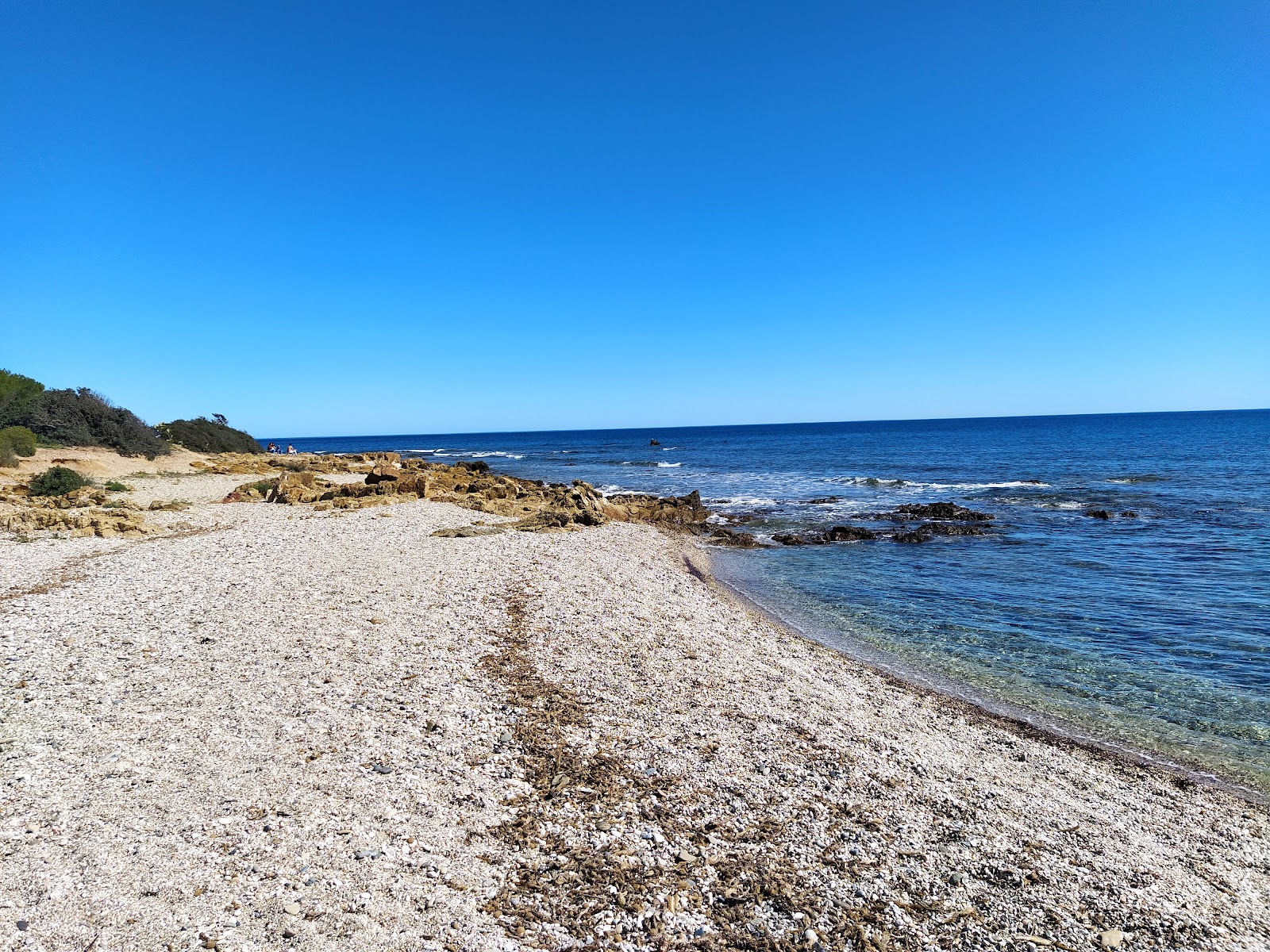 Porto Corallino Beach'in fotoğrafı doğal alan içinde bulunmaktadır