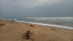 Foto di Rajaram Puram Beach con una superficie del acqua turchese