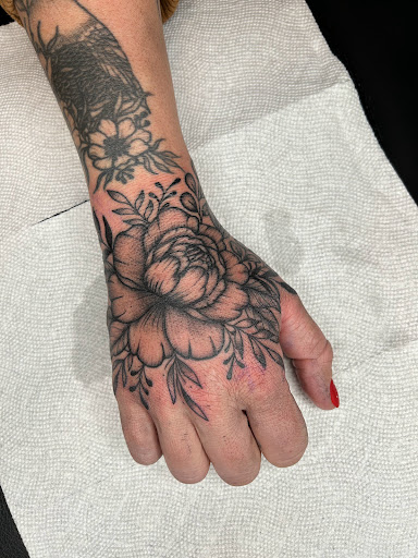 Explore tattoo ideas for moms with a son, creative tattoo ideas in Savannah, available at Tramp Art Studios