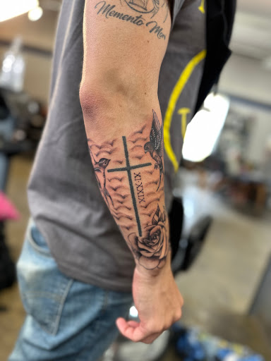 Find book of tattoo ideas for your next unique tattoo in Bloomington at Crimson Breed Tattoo Studio