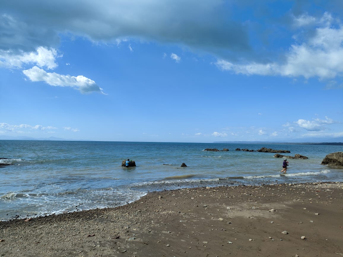 Fotografija Playa Pogeres z turkizna voda površino