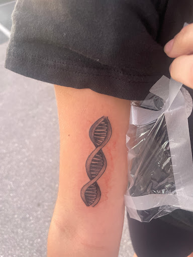 Find rib tattoo ideas for females for your next unique tattoo in Fort Myers at Loyal 2 The Coil Tattoos & Piercings (Edison Mall Location Entrance F)