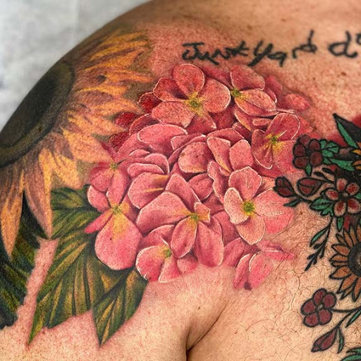 Explore arm filler tattoo ideas, creative tattoo ideas in Nashville, available at Titan Tattoo