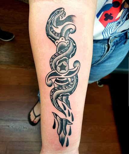 Explore family tattoo ideas for dads, creative tattoo ideas in Clearwater, available at Moniques Body Art