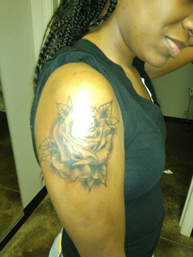 Find inbetween boob tattoo ideas for your next unique tattoo in Sherwood at Diamond State Tattoo Parlor