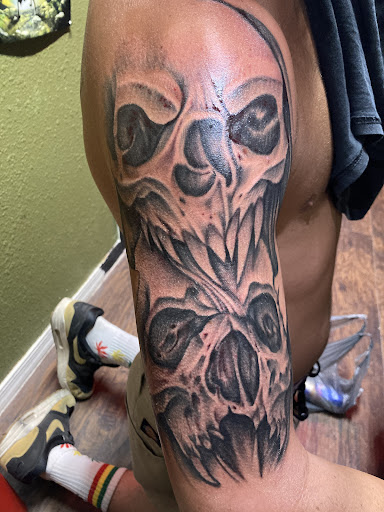 Explore sleeve tattoo cover up ideas, creative tattoo ideas in Bullhead City, available at Smoke and Dagger Tattoo