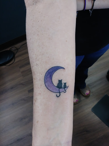 Explore koi fish tattoo ideas, creative tattoo ideas in Eustis, available at Iron Will Tattoo