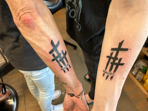 Explore men's back tattoos ideas, creative tattoo ideas in Des Moines, available at Adrenaline Studios Tattoo