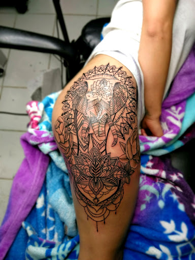 Explore snake tattoo ideas for females, creative tattoo ideas in Yakima, available at Inkarnation Tattoo