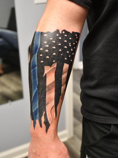 Explore jormungandr tattoo ideas, creative tattoo ideas in Greenfield, available at Tattoos In Time Studio