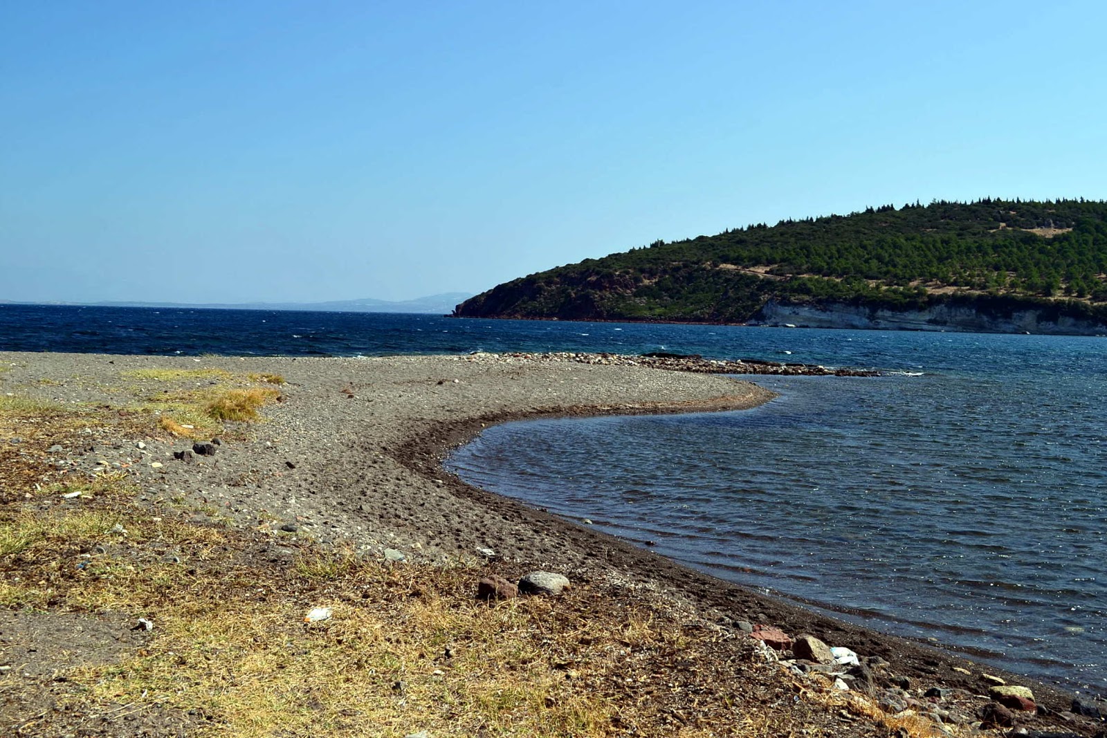 Foto av Sebatepolis beach med stenar yta