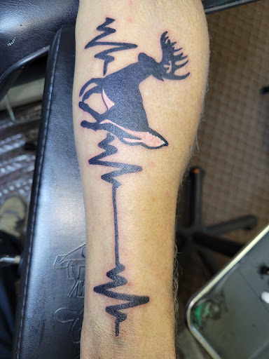 Explore mechanic tattoo sleeve ideas, creative tattoo ideas in Angola, available at Hoodlum Ink