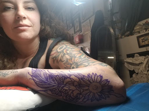 Explore husband and wife matching tattoo ideas, creative tattoo ideas in Colorado Springs, available at Fallen Heroes Tattoo & Piercing (Colorado)