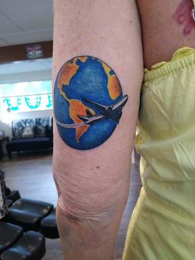 Explore circle tattoo cover up ideas, creative tattoo ideas in New Braunfels, available at To The Moon Tattoo Studio
