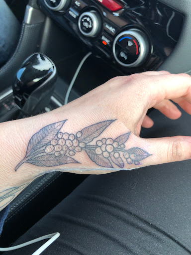 Explore spine tattoo cover up ideas, creative tattoo ideas in Columbus, available at Evolved Body Art